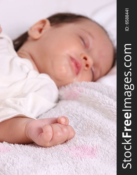 Cute baby girl sleeping in her bed. Cute baby girl sleeping in her bed