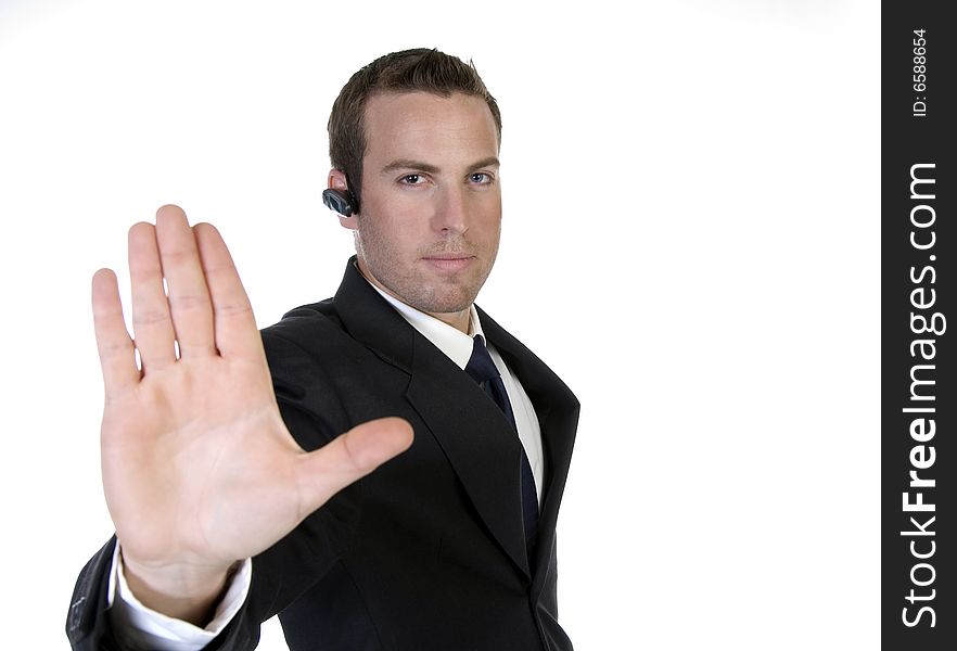 Businessman holding hand out in protest with white background