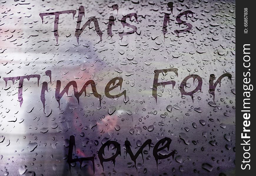 Background with text drawn on a condensation window with water drops texture. Background with text drawn on a condensation window with water drops texture