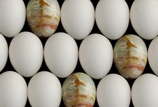 Gem Eggs Among Chicken Eggs Stock Photography