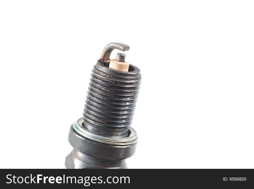 Macro shot of a spark plug isolated on white