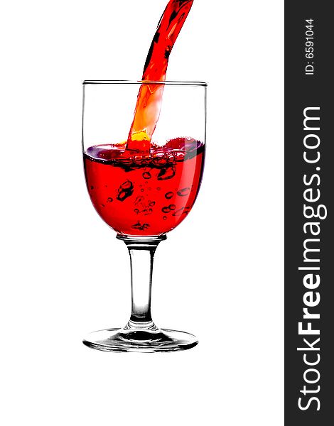 Red wine flows in a glass. Red wine flows in a glass