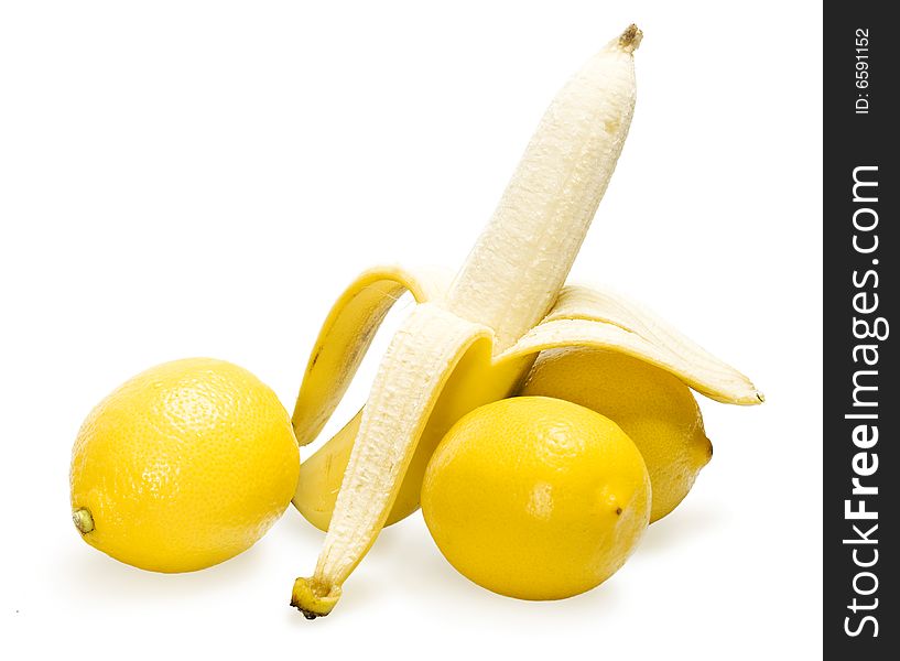 Banana and lemons isolated on white background