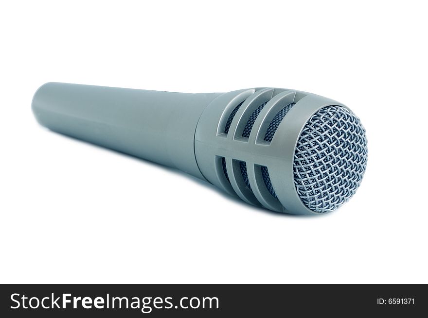 Dynamic microphone for karaoke and plug connector against white,  blue toned