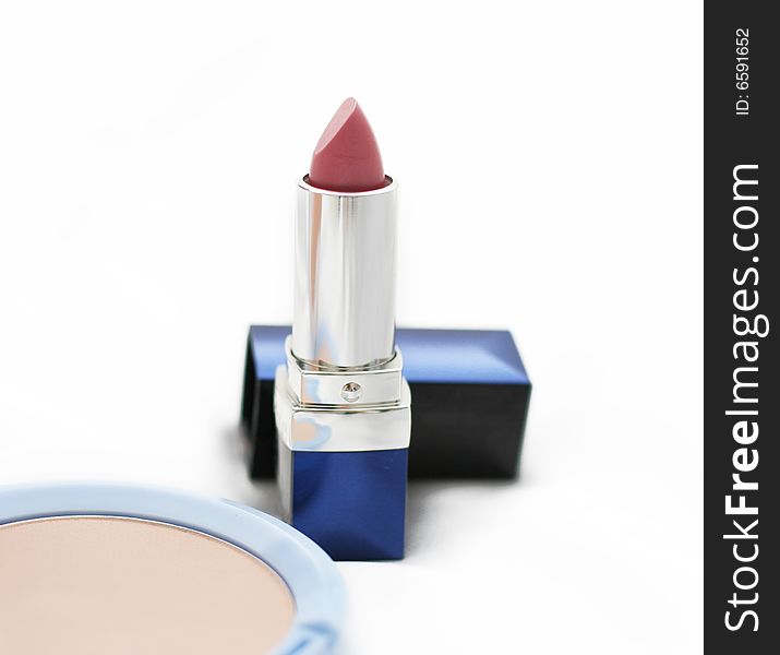 Close-up of a lipstick over white background. Close-up of a lipstick over white background