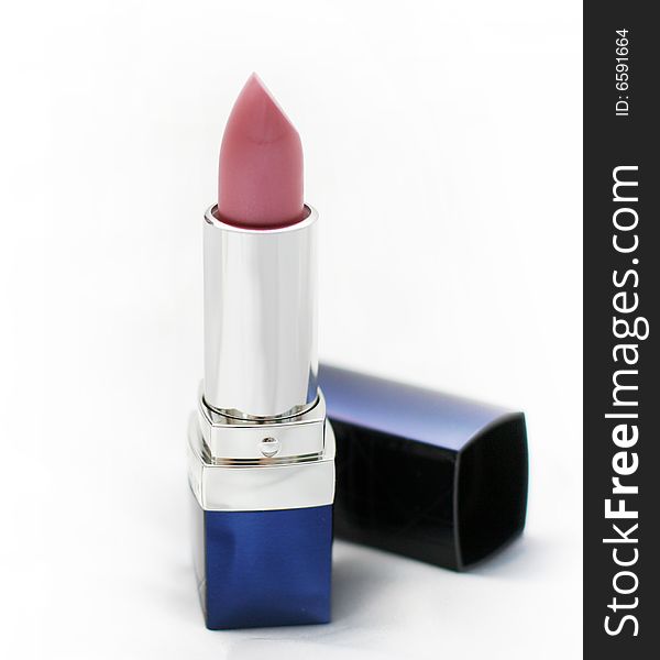 Close-up of a lipstick over white background. Close-up of a lipstick over white background