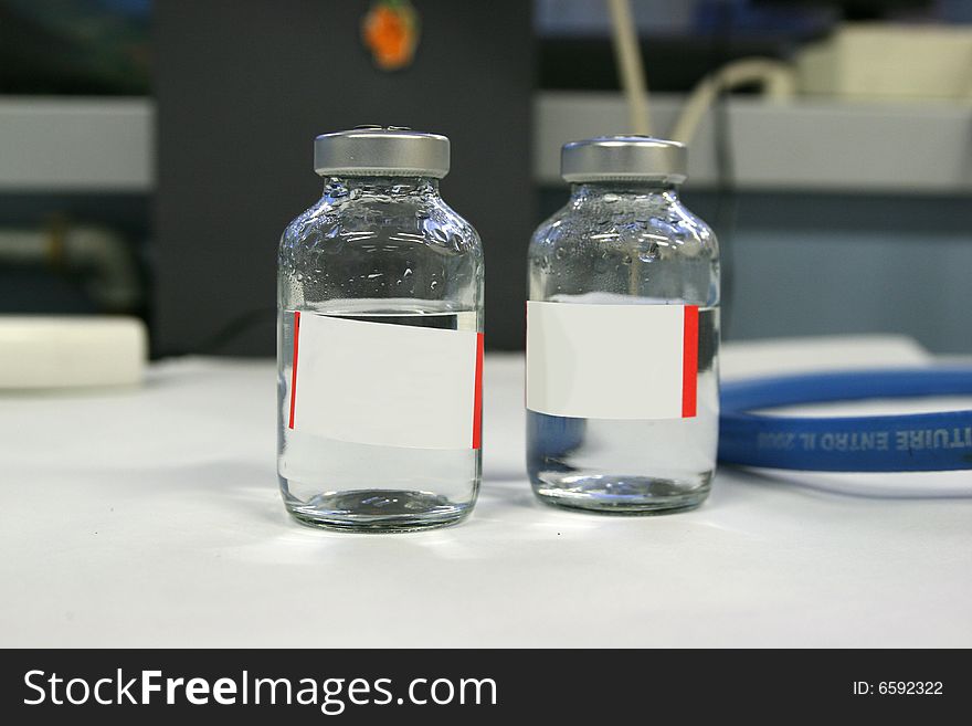 Laboratory analysis tools with glass bottles. Laboratory analysis tools with glass bottles