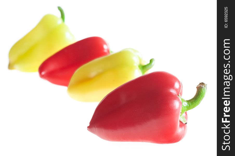 Fresh color peppers isolated on white. Fresh color peppers isolated on white
