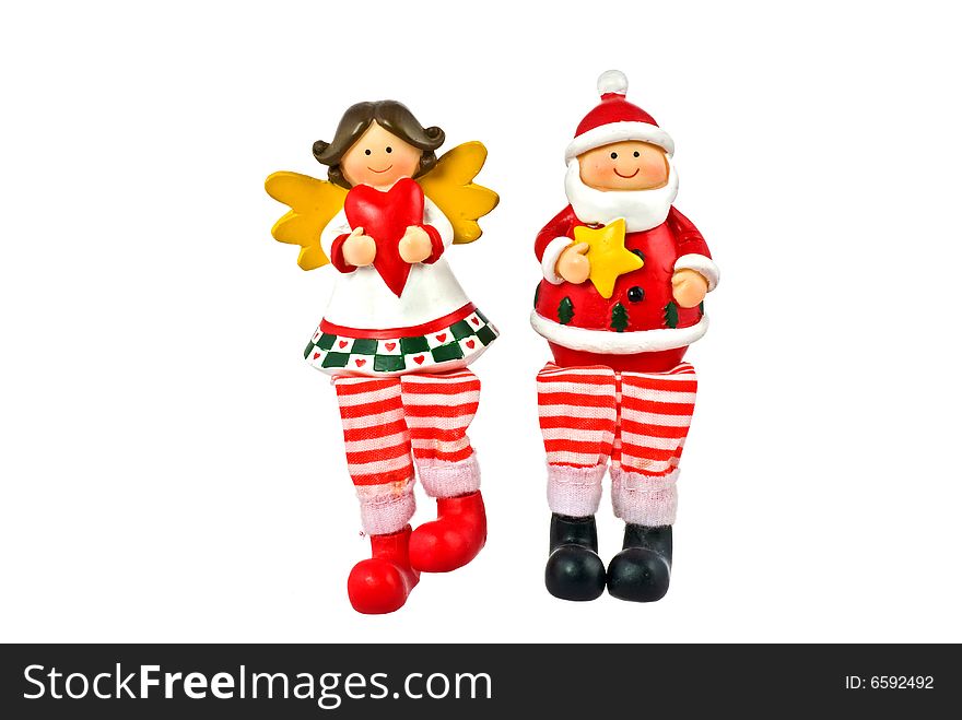 Angel and Santa Claus figurines. Christmas decoration.