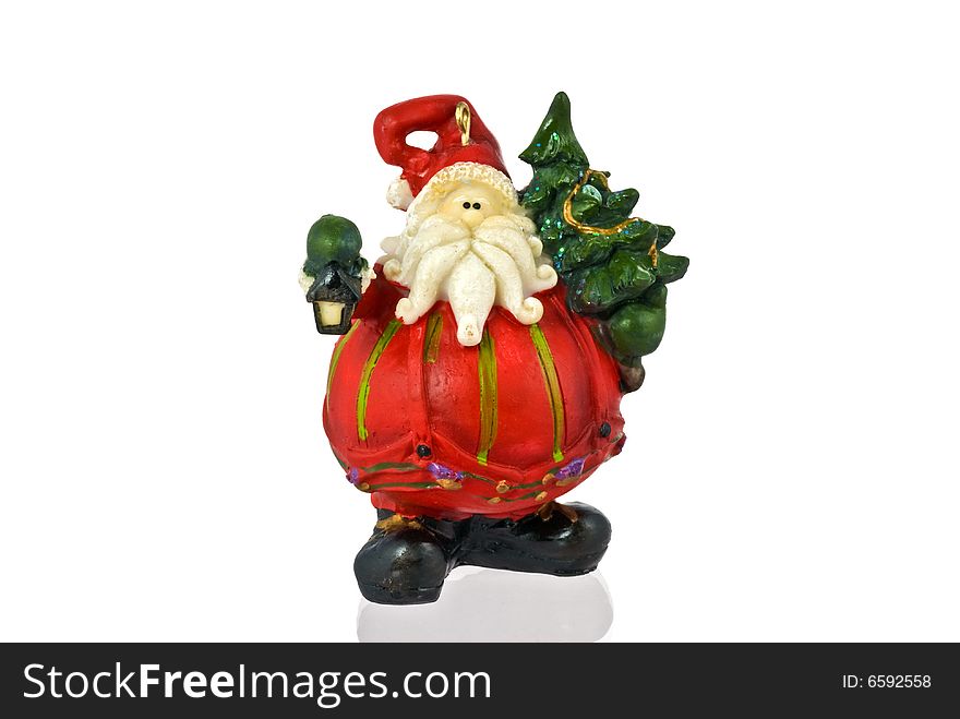 Santa Claus figurine with Xmas Tree. Santa Claus figurine with Xmas Tree