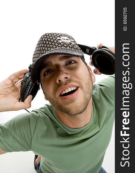 Male holding headphone with white background