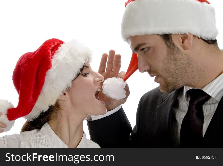 Happy couple with red santa cap isolated on white background