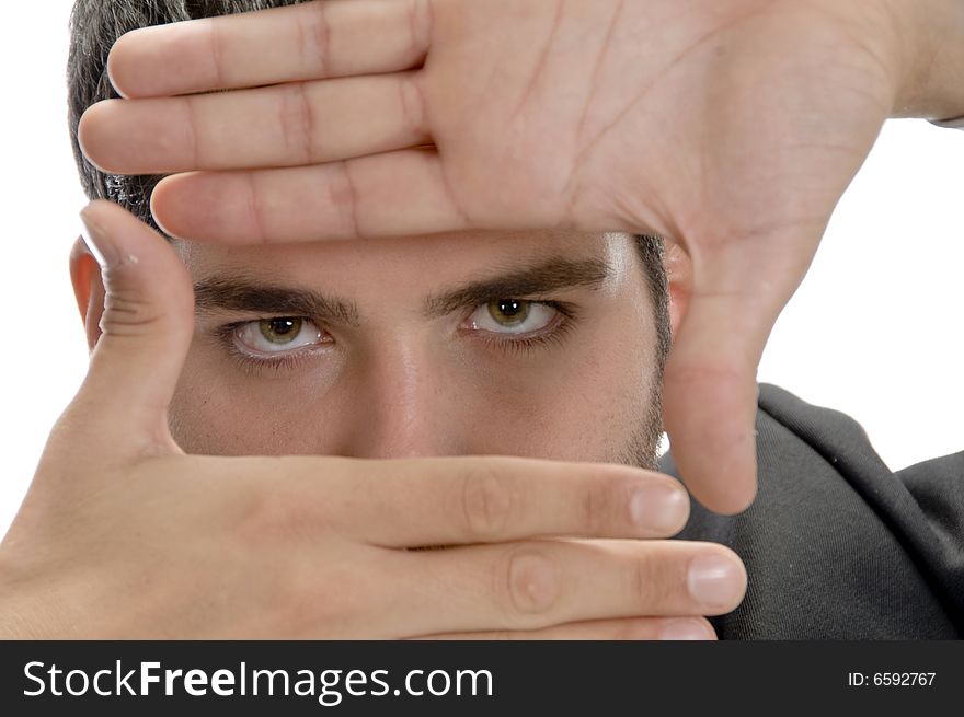 Businessman making frame with fingers with white background