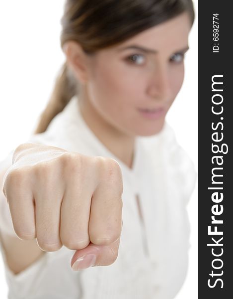 Young lady showing punch on an isolated background