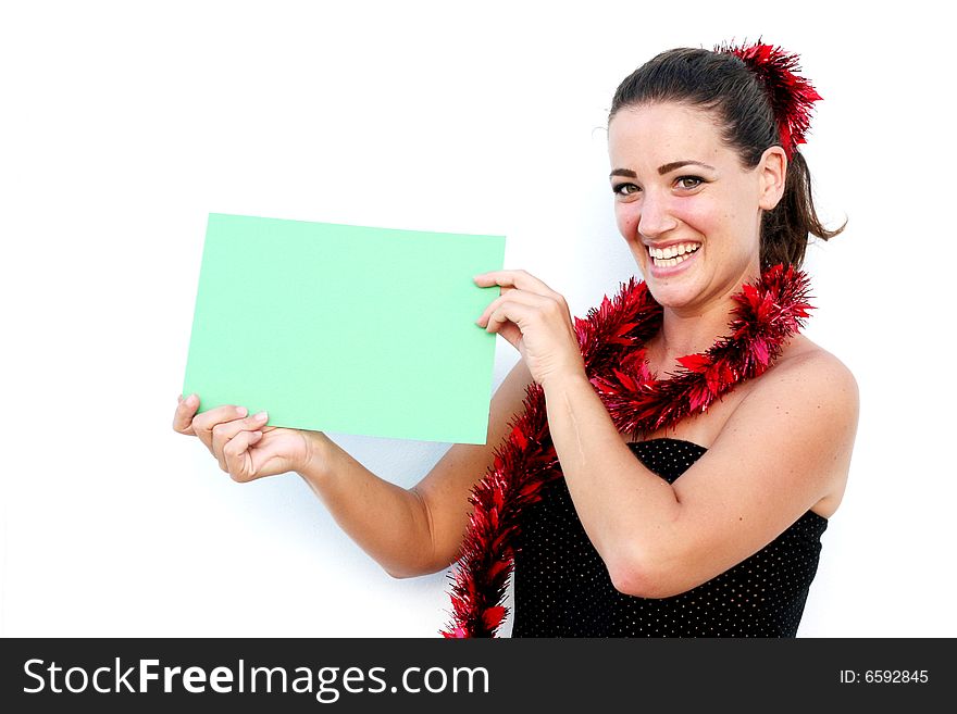 Beautiful woman holding a green card for Christmas. Beautiful woman holding a green card for Christmas.