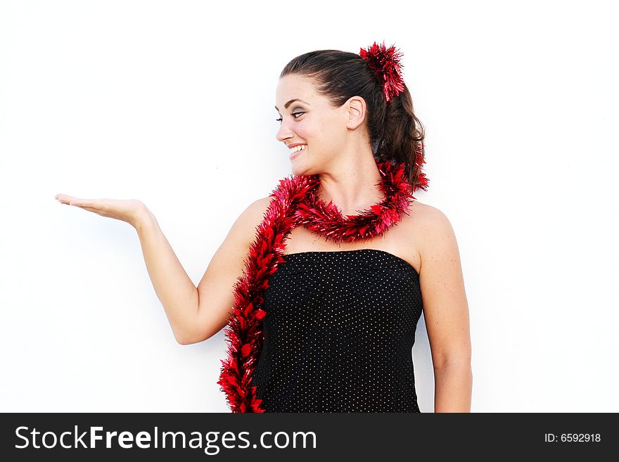 Beautiful young woman dressed in a festive Christmas outfit. Beautiful young woman dressed in a festive Christmas outfit.