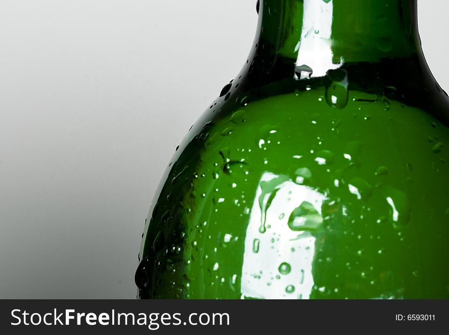 Green bottle on grey background