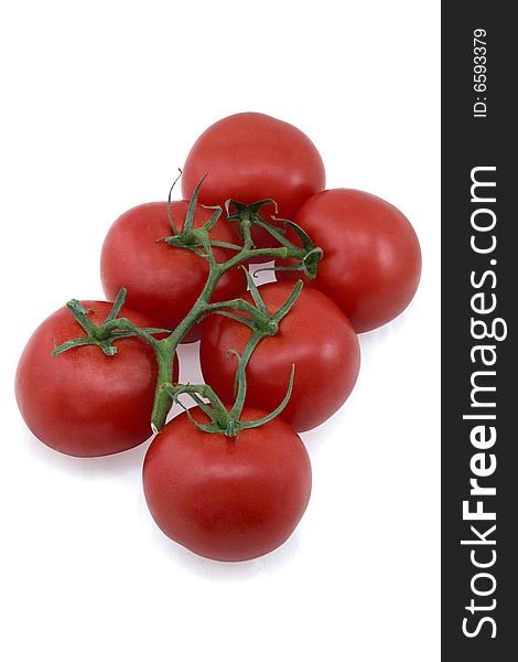 A bunch of red tomatoes on white background