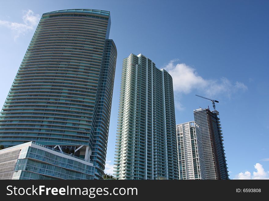 Low angle view of luxury condominiums located at Downtown Miami. Low angle view of luxury condominiums located at Downtown Miami