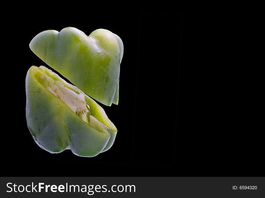 Pepper cut into two sections with a knife