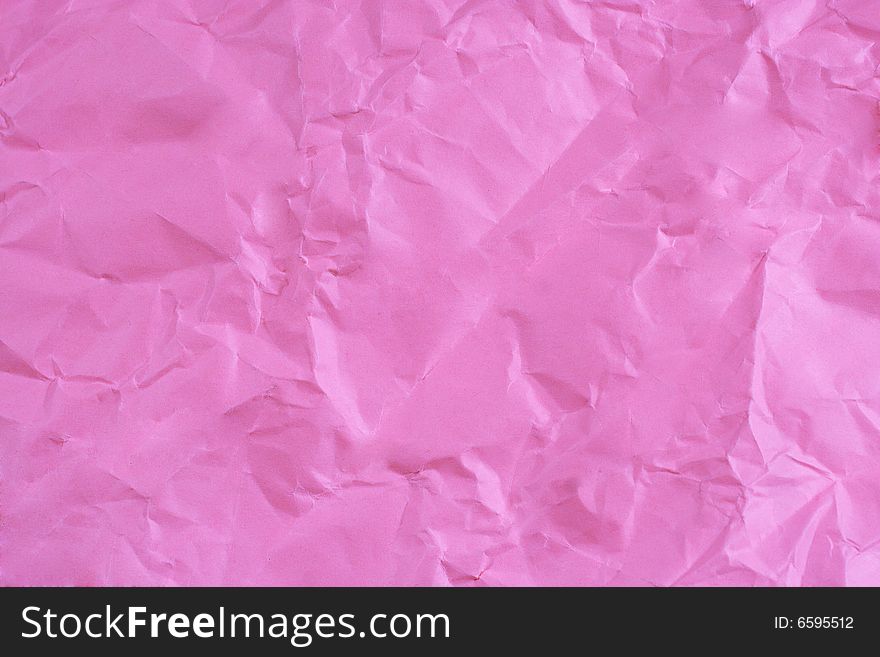 Crumpled pink paper (as a background)