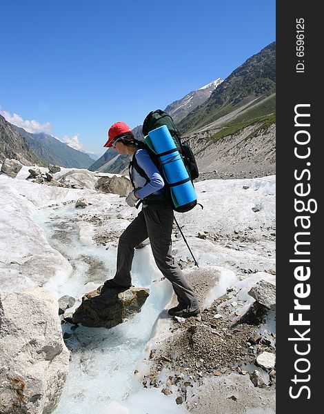Hiker in mountain, Caucasus, Bezengy