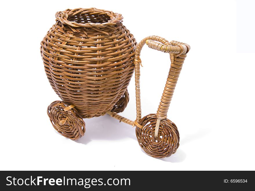 Wooden bicycle with a basket - toy on a white background