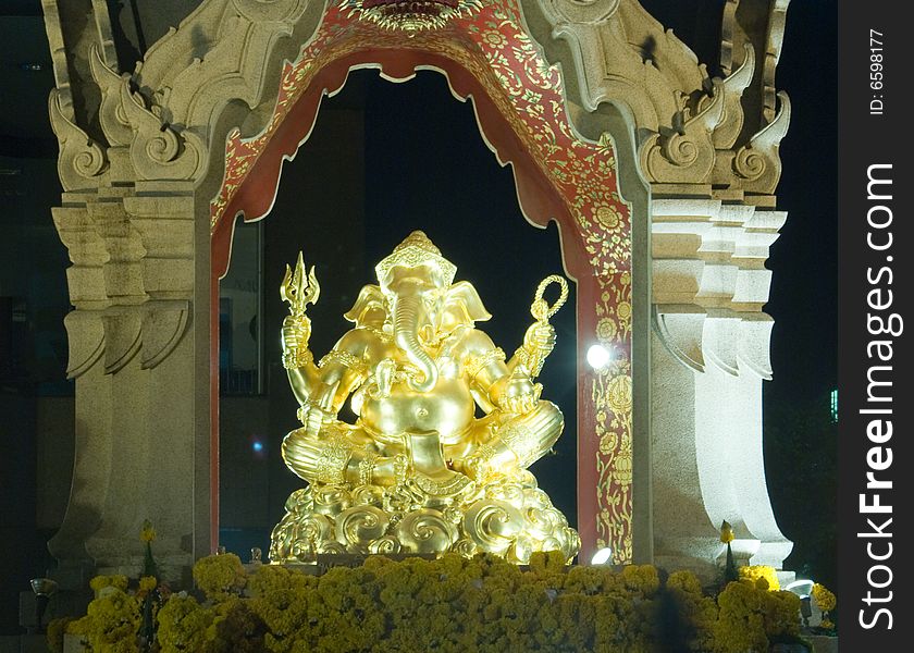 Golden night view of four faces buddha in bangkok