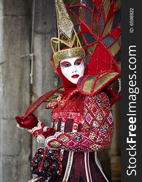 Red and Gold costume a the Venice Carnival. Red and Gold costume a the Venice Carnival