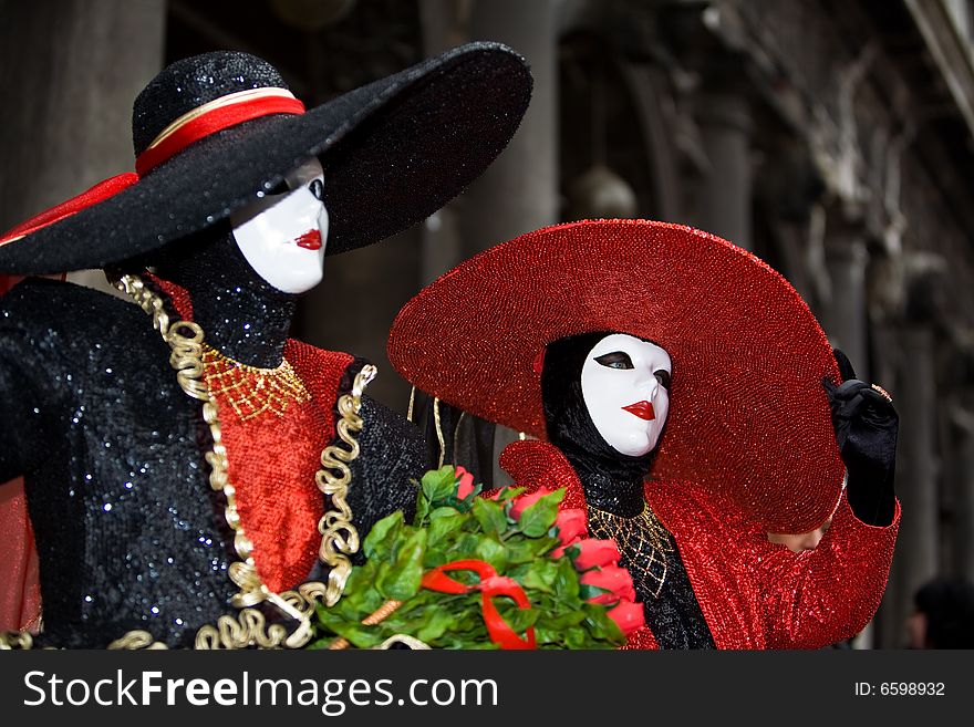 Red and black costume at the Venice Carnival. Red and black costume at the Venice Carnival