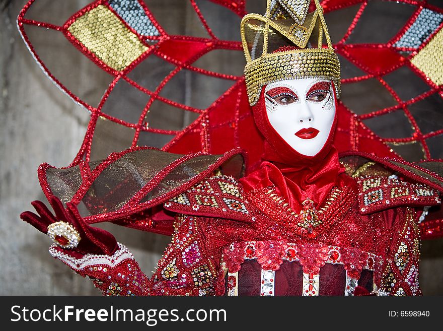 Red and Gold costume a the Venice Carnival. Red and Gold costume a the Venice Carnival