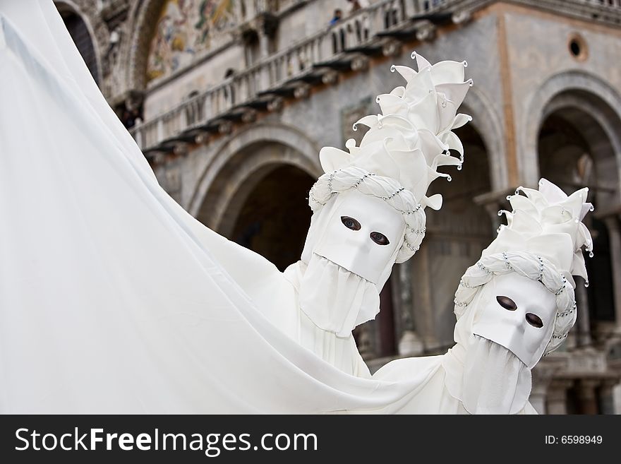 Two people in costume at the Venice Carnival. Two people in costume at the Venice Carnival