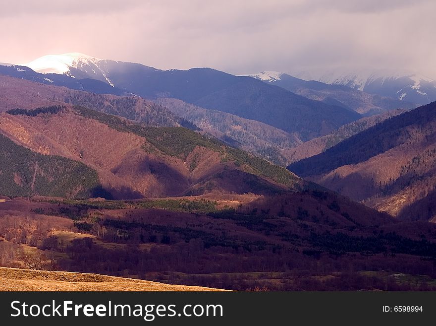 Mountain scenery with high hills - brown,green colors. Mountain scenery with high hills - brown,green colors.