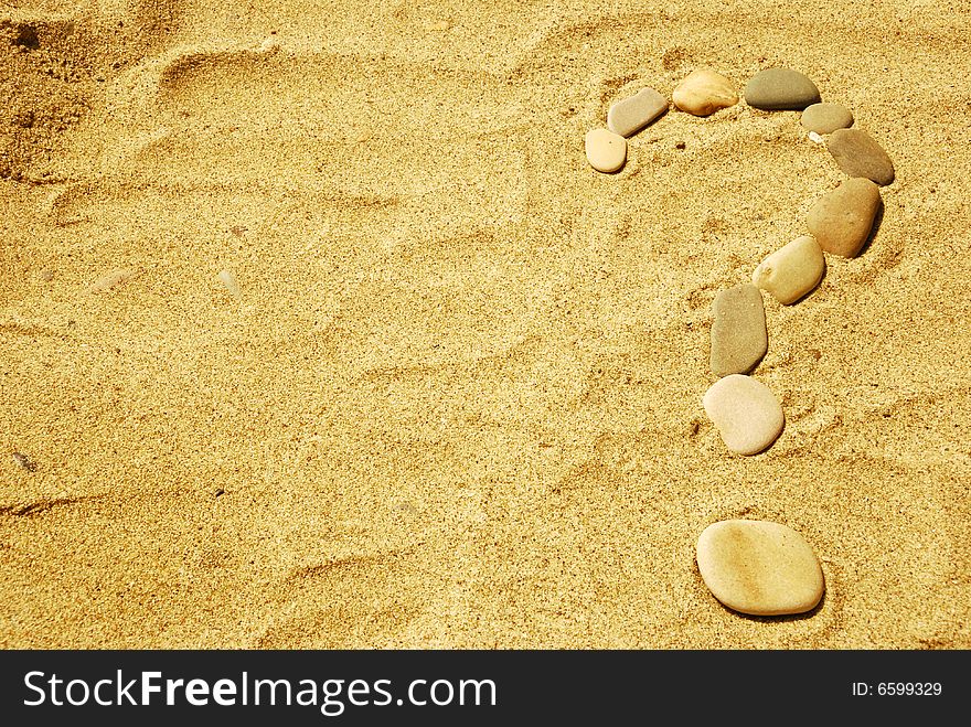 Stones on sand