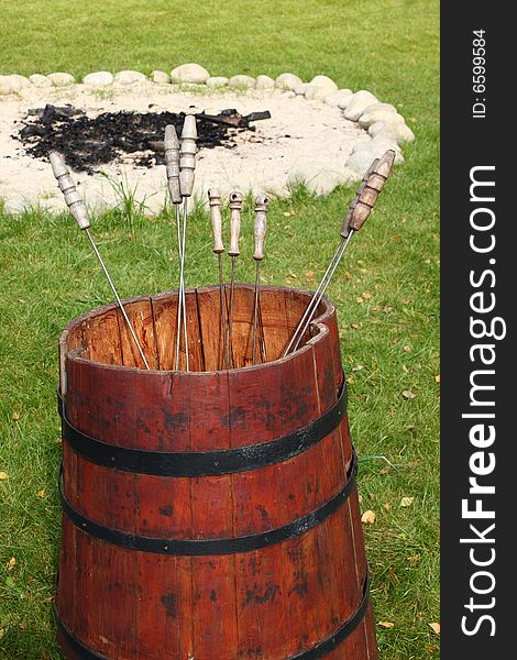 Red Barrel With Metal Skewers