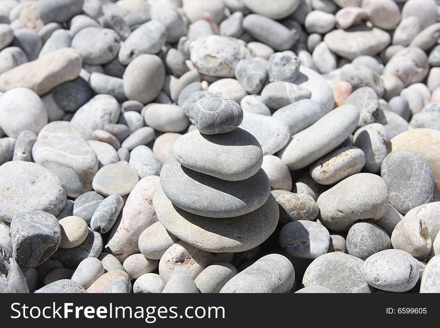 Tower made of round pebble stones