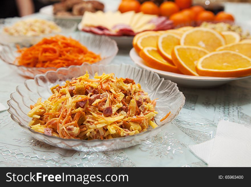 Crab salad on a plate on the festive table