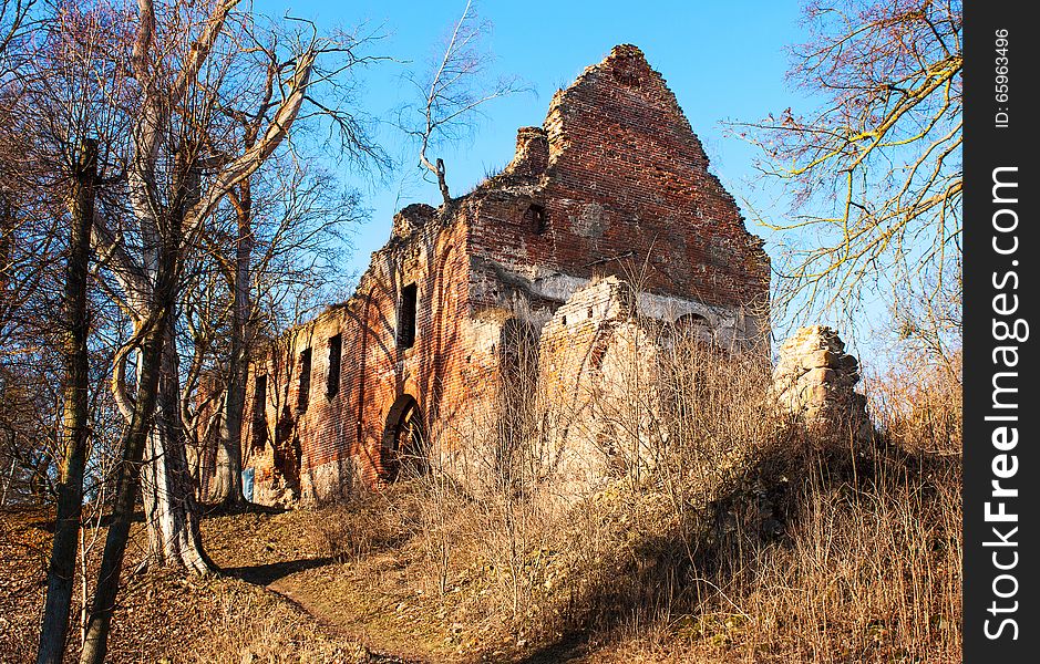 Old ruined church on sunny winter day