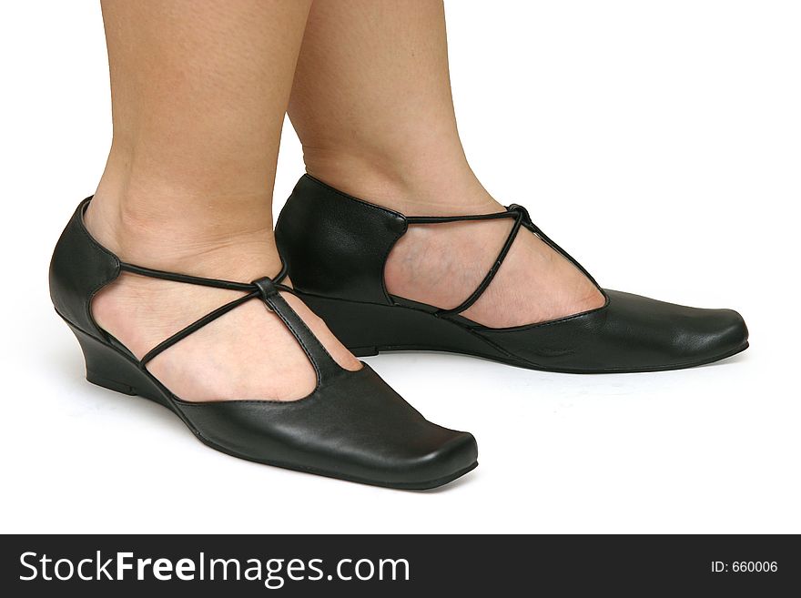 A pair of black strapped ladies' sandals. A pair of black strapped ladies' sandals
