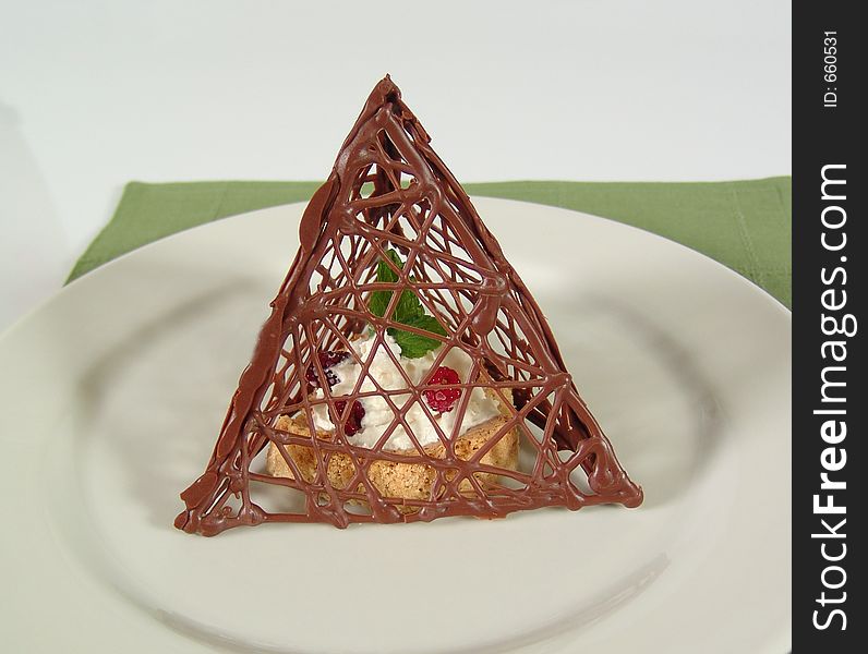 Chocolate pyramide with dessert. Chocolate pyramide with dessert