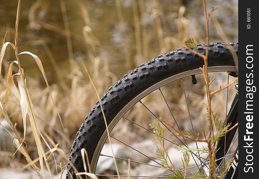 A mountain bike wheel in the outdoors