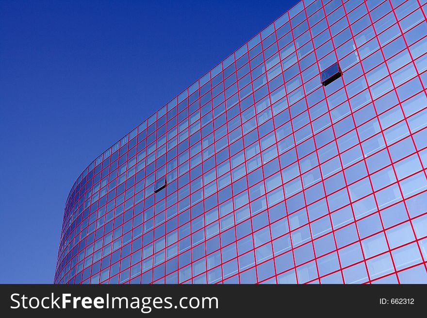Glass building with red stripes. Glass building with red stripes