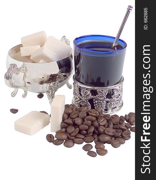 Coffee cup and refined sugar and coffee-beans. Coffee cup and refined sugar and coffee-beans