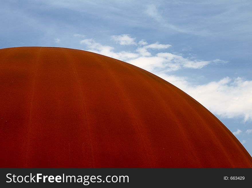 Blue sky and rusty metal dome. Blue sky and rusty metal dome