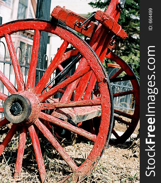 Two red wagon wheels