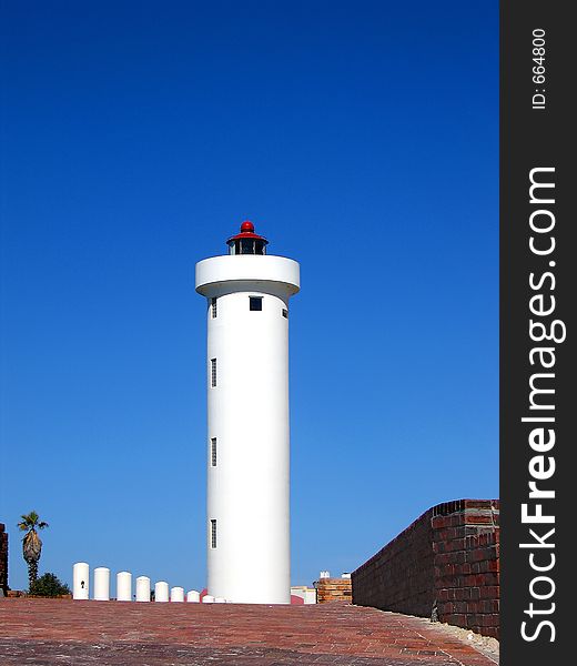 Portrait shot of a coastal lighthouse. Portrait shot of a coastal lighthouse.