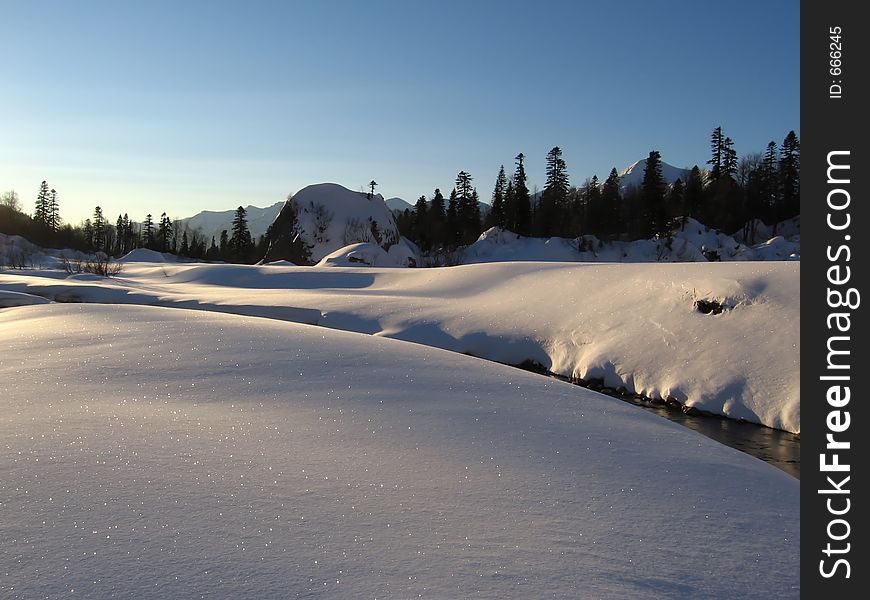 Sunny morning in Caucasus mountains in winter, Russia. Sunny morning in Caucasus mountains in winter, Russia