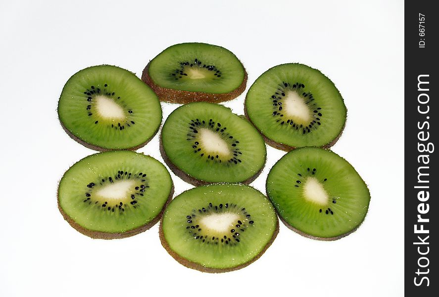 Kiwi slices over white