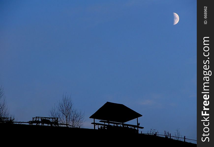 Evening landscape with dark blue sky and moon. Evening landscape with dark blue sky and moon