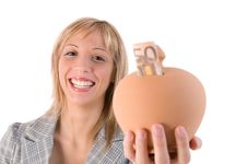 Young Smiling Woman Holding A Piggy Bank Stock Photos
